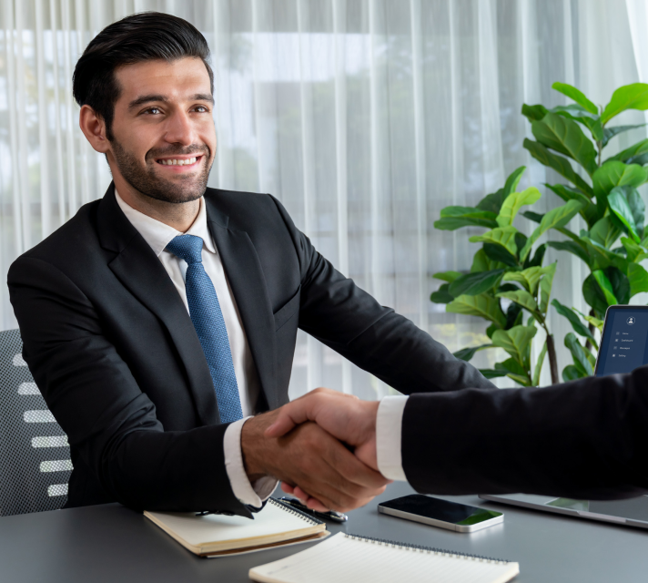 Become a customer , Handshake between client and MNT representative with Happy customer consulting with MNT Construction team in Pune